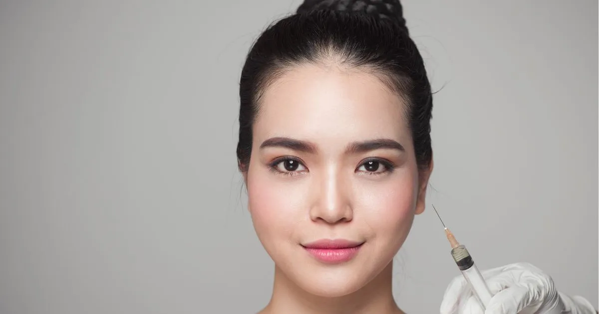 Woman with smooth, youthful skin and natural expression after Daxxify Injections for wrinkle reduction